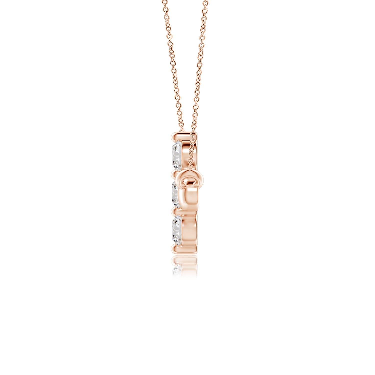 Hanging sideways from a chain is the gorgeous cross pendant crafted in 14k rose gold. The vertical bar of the cross is adorned with three white diamonds in prong setting. The sparkling diamonds lend an impeccable dazzling effect to this lustrous