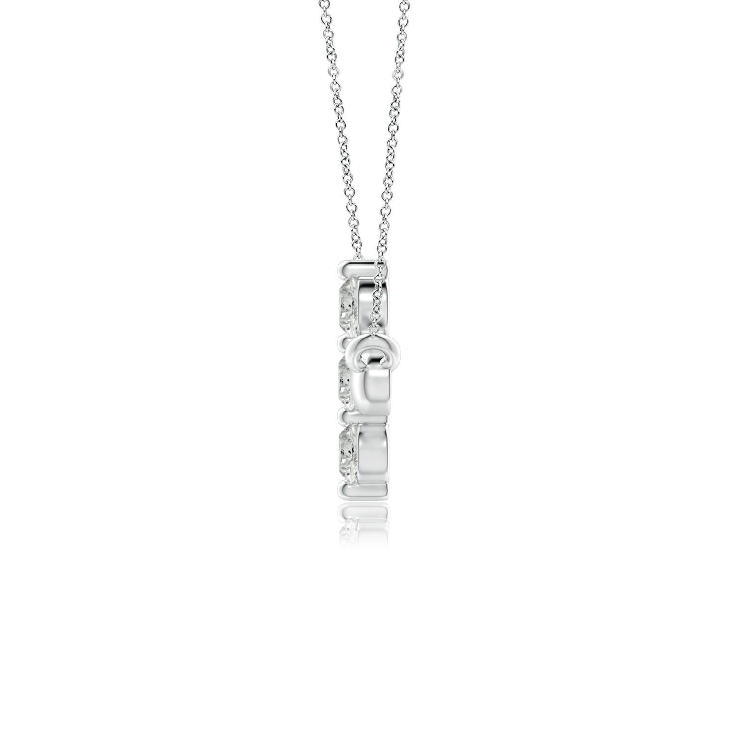 Hanging sideways from a chain is the gorgeous cross pendant crafted in 14k white gold. The vertical bar of the cross is adorned with three white diamonds in prong setting. The sparkling diamonds lend an impeccable dazzling effect to this lustrous