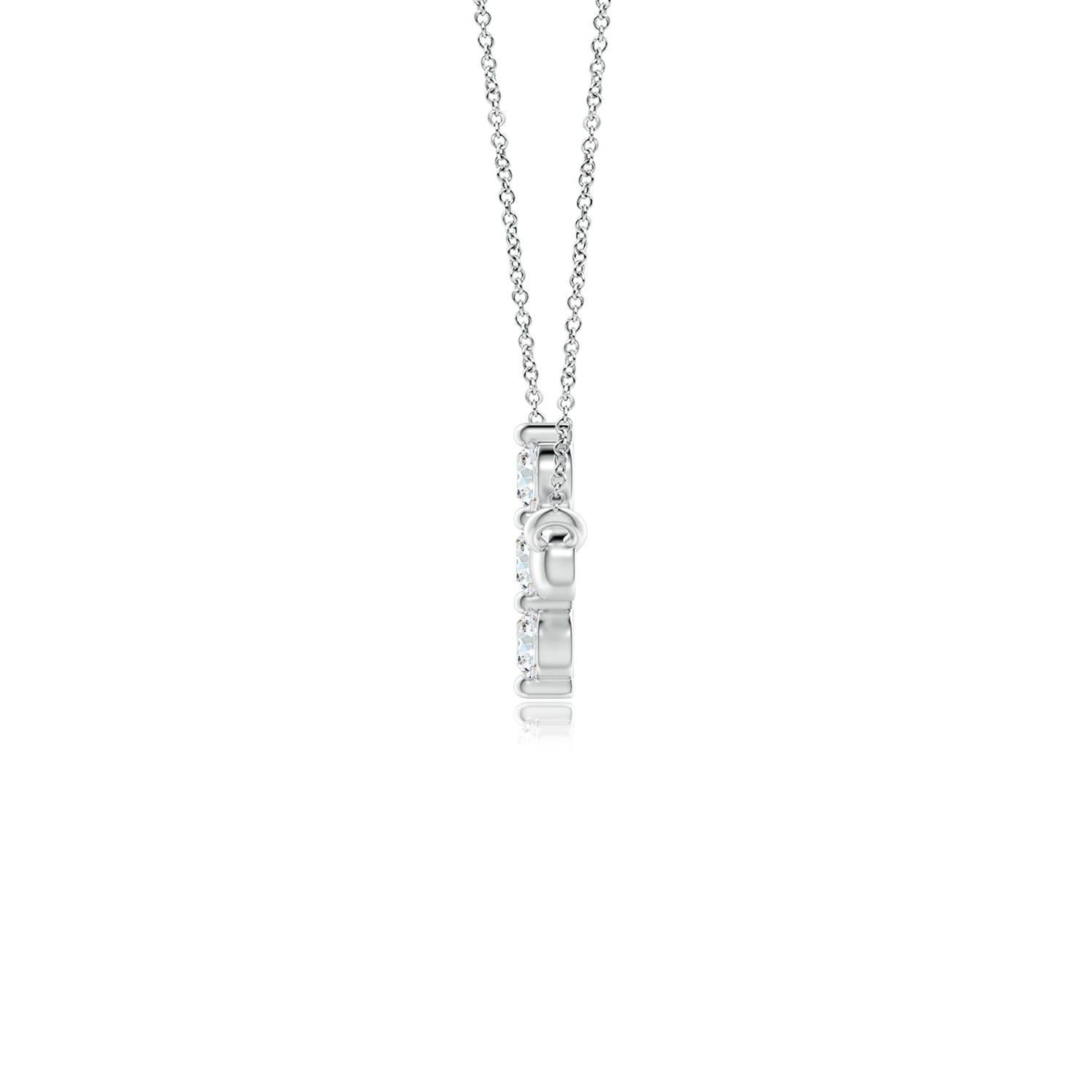Hanging sideways from a chain is the gorgeous cross pendant crafted in 14k white gold. The vertical bar of the cross is adorned with three white diamonds in prong setting. The sparkling diamonds lend an impeccable dazzling effect to this lustrous