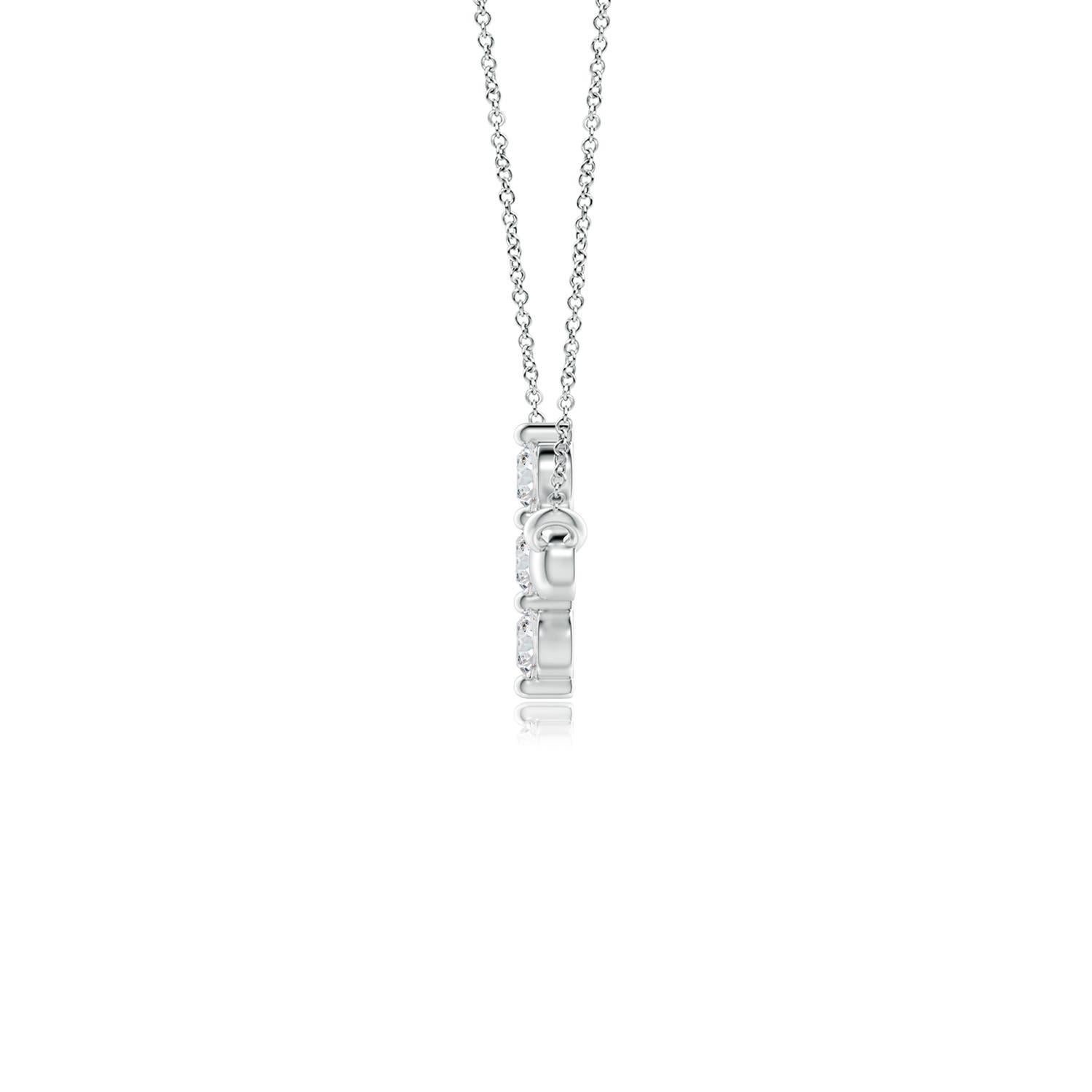 Hanging sideways from a chain is the gorgeous cross pendant crafted in 14k white gold. The vertical bar of the cross is adorned with three white diamonds in prong setting. The sparkling diamonds lend an impeccable dazzling effect to this lustrous