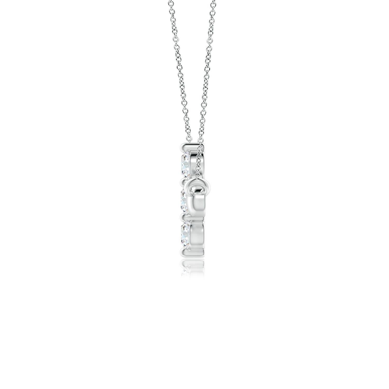 Hanging sideways from a chain is the gorgeous cross pendant crafted in 14k white gold. The vertical bar of the cross is adorned with three white diamonds in prong setting. The sparkling diamonds lend an impeccable dazzling effect to this lustrous