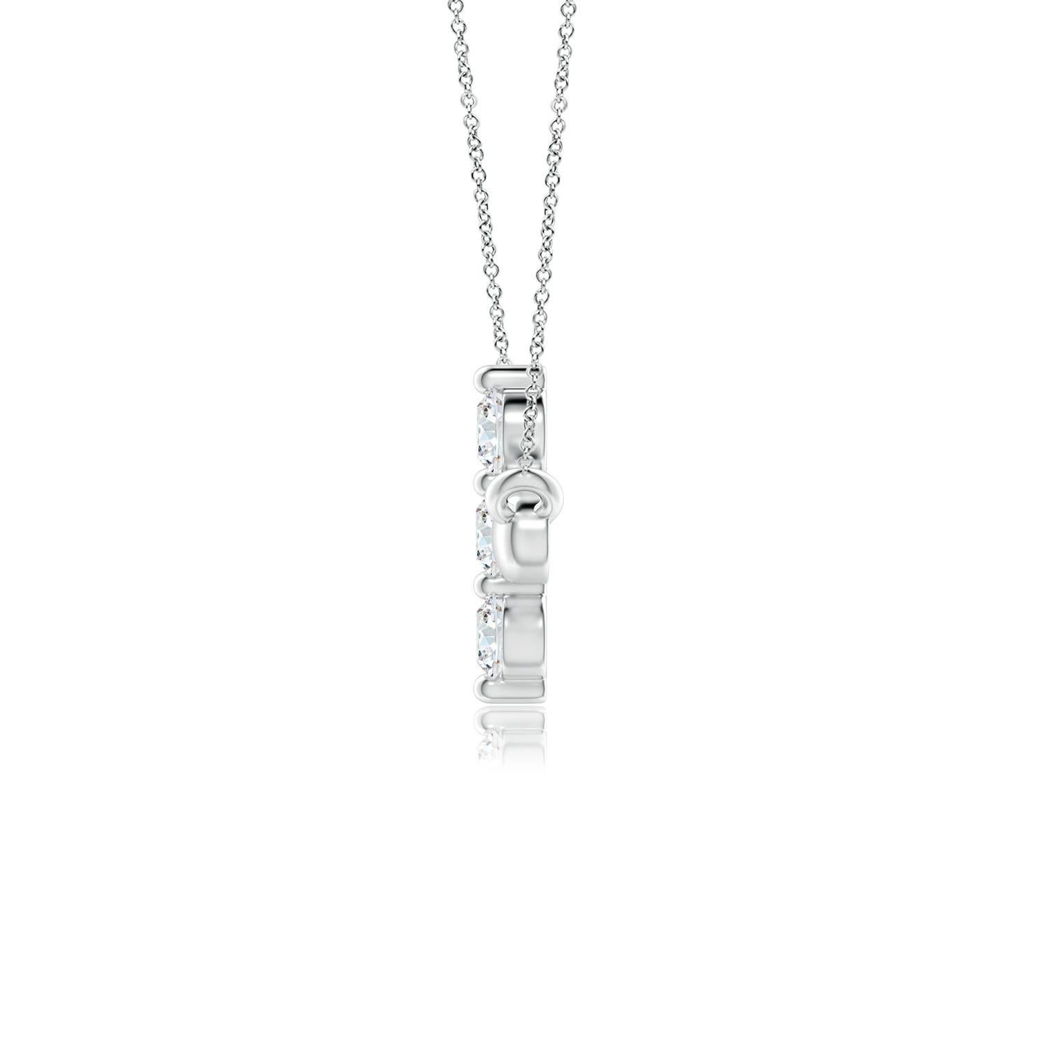 Hanging sideways from a chain is the gorgeous cross pendant crafted in 14k white gold. The vertical bar of the cross is adorned with three white diamonds in prong setting. The sparkling diamonds lend an impeccable dazzling effect to this lustrous