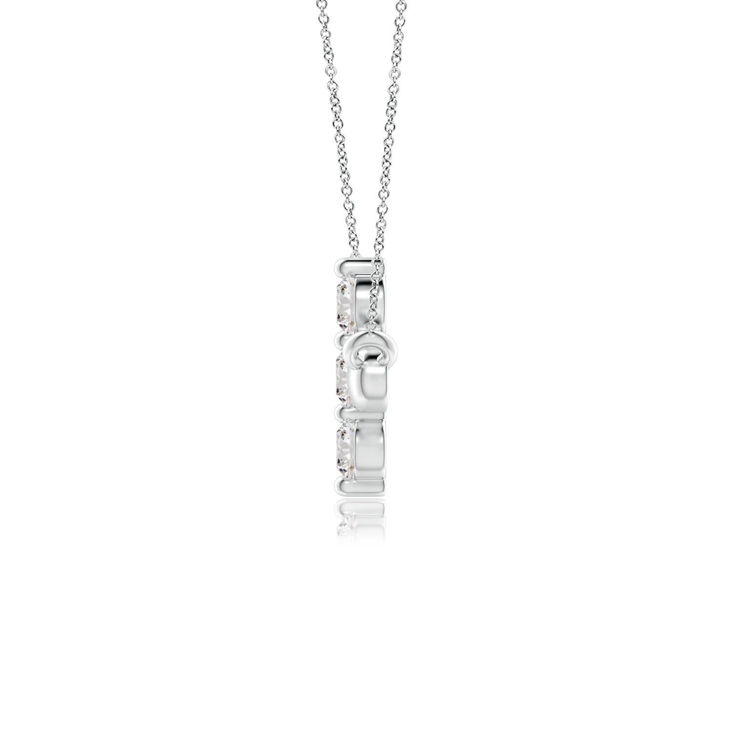 Hanging sideways from a chain is the gorgeous cross pendant crafted in 14k white gold. The vertical bar of the cross is adorned with three white diamonds in prong setting. The sparkling diamonds lend an impeccable dazzling effect to this lustrous