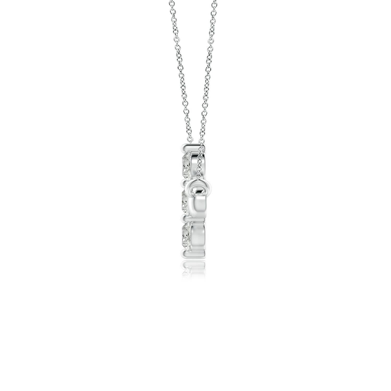 Hanging sideways from a chain is the gorgeous cross pendant crafted in 14k white gold. The vertical bar of the cross is adorned with three white diamonds in prong setting. The sparkling diamonds lend an impeccable dazzling effect to this lustrous