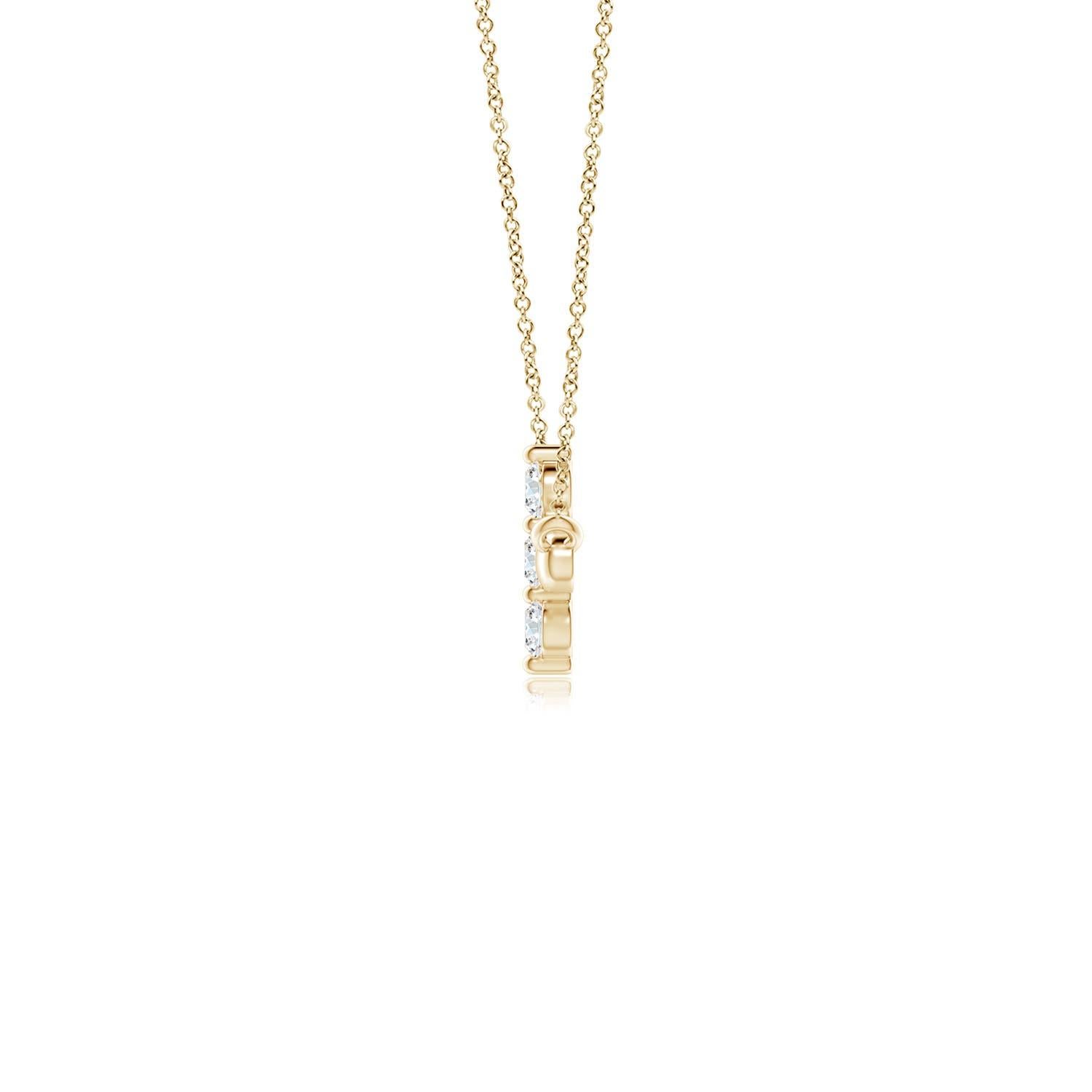 Hanging sideways from a chain is the gorgeous cross pendant crafted in 14k yellow gold. The vertical bar of the cross is adorned with three white diamonds in prong setting. The sparkling diamonds lend an impeccable dazzling effect to this lustrous