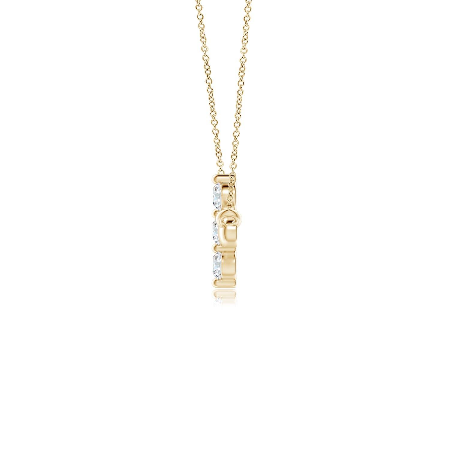 Hanging sideways from a chain is the gorgeous cross pendant crafted in 14k yellow gold. The vertical bar of the cross is adorned with three white diamonds in prong setting. The sparkling diamonds lend an impeccable dazzling effect to this lustrous