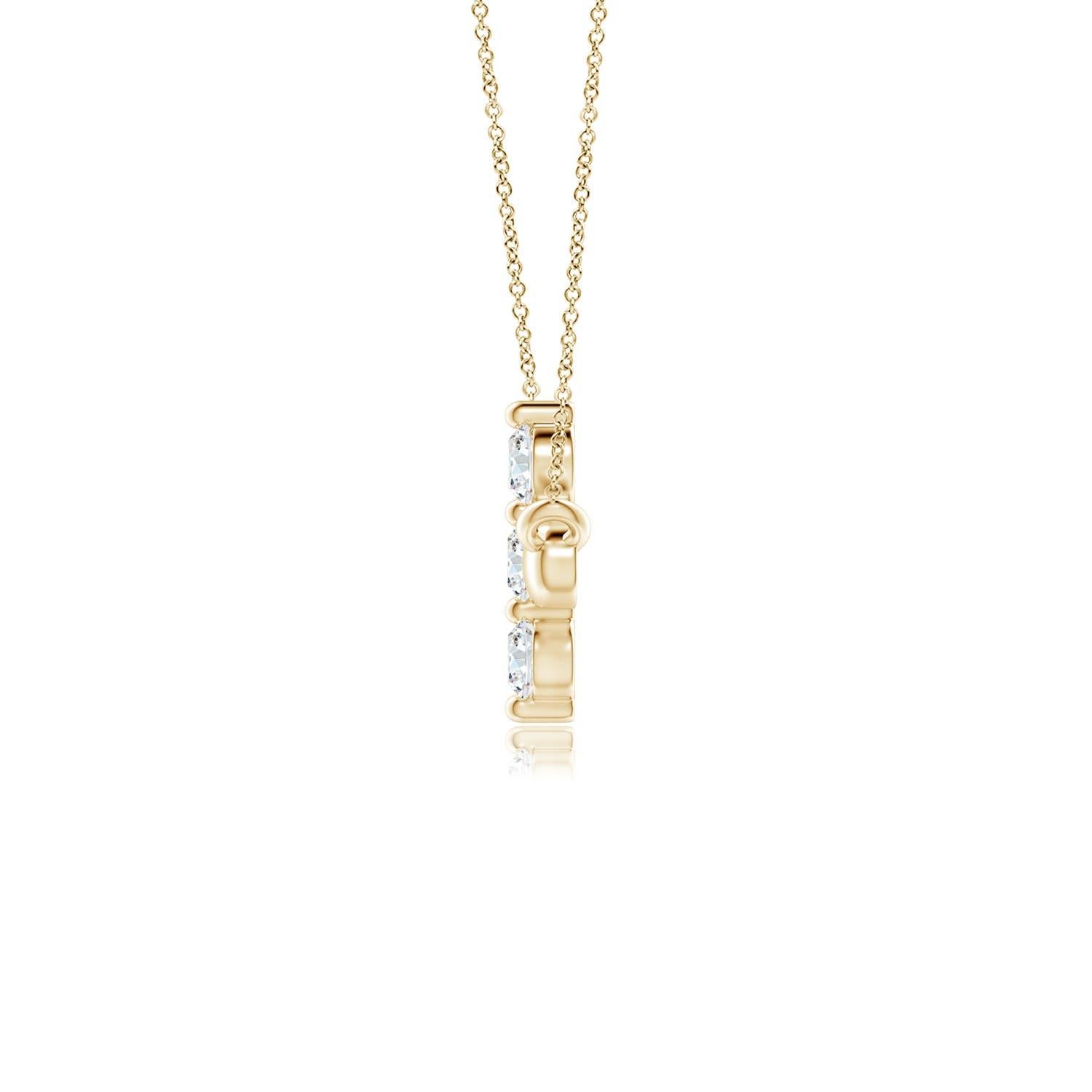 Hanging sideways from a chain is the gorgeous cross pendant crafted in 14k yellow gold. The vertical bar of the cross is adorned with three white diamonds in prong setting. The sparkling diamonds lend an impeccable dazzling effect to this lustrous
