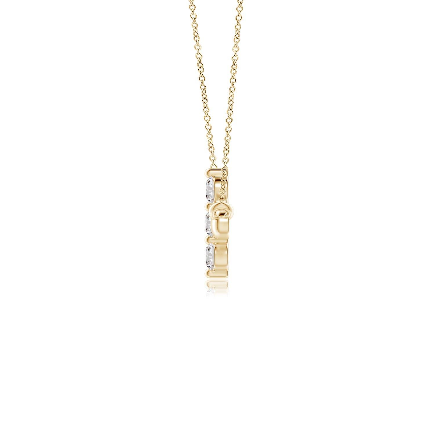 Hanging sideways from a chain is the gorgeous cross pendant crafted in 14k yellow gold. The vertical bar of the cross is adorned with three white diamonds in prong setting. The sparkling diamonds lend an impeccable dazzling effect to this lustrous