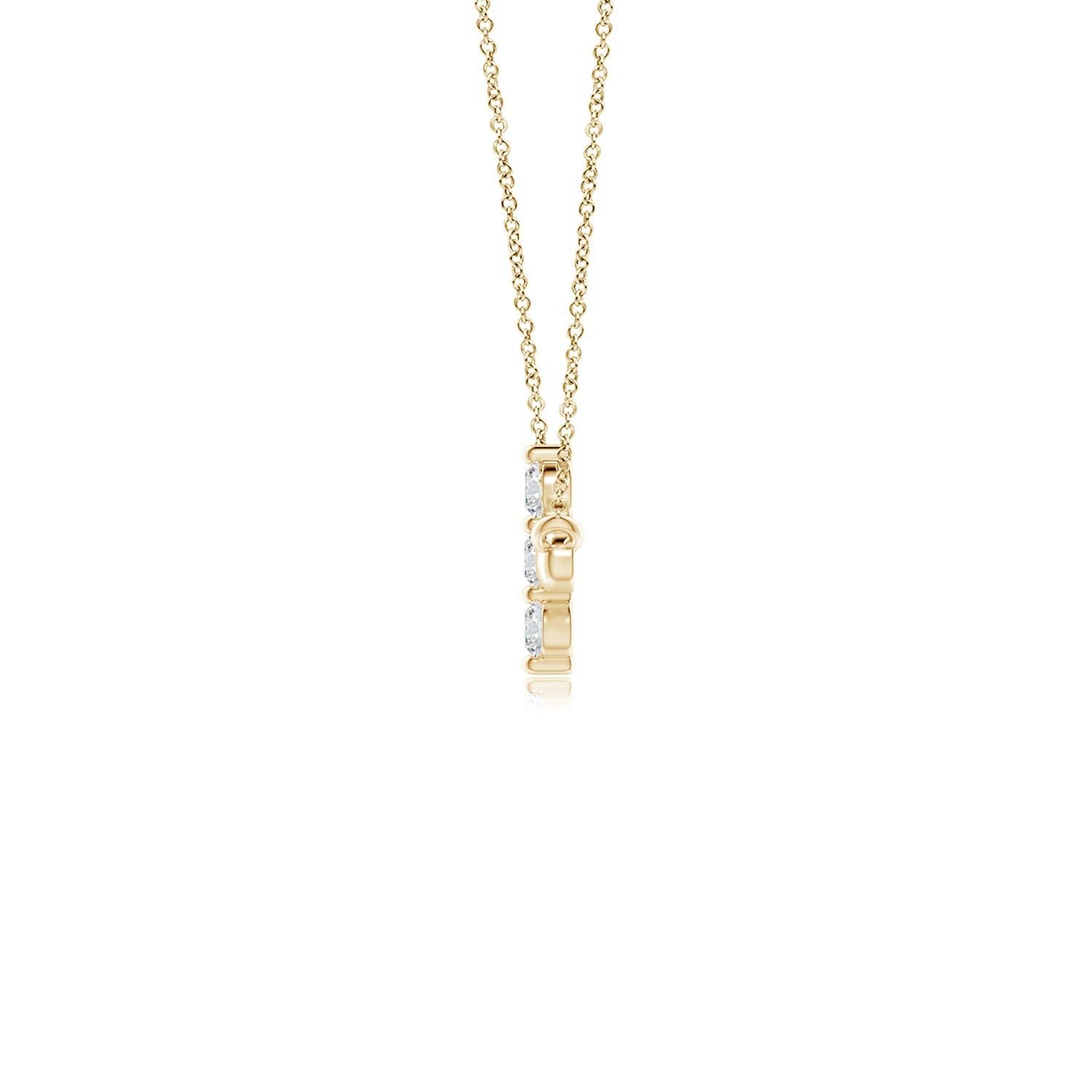Hanging sideways from a chain is the gorgeous cross pendant crafted in 14k yellow gold. The vertical bar of the cross is adorned with three white diamonds in prong setting. The sparkling diamonds lend an impeccable dazzling effect to this lustrous