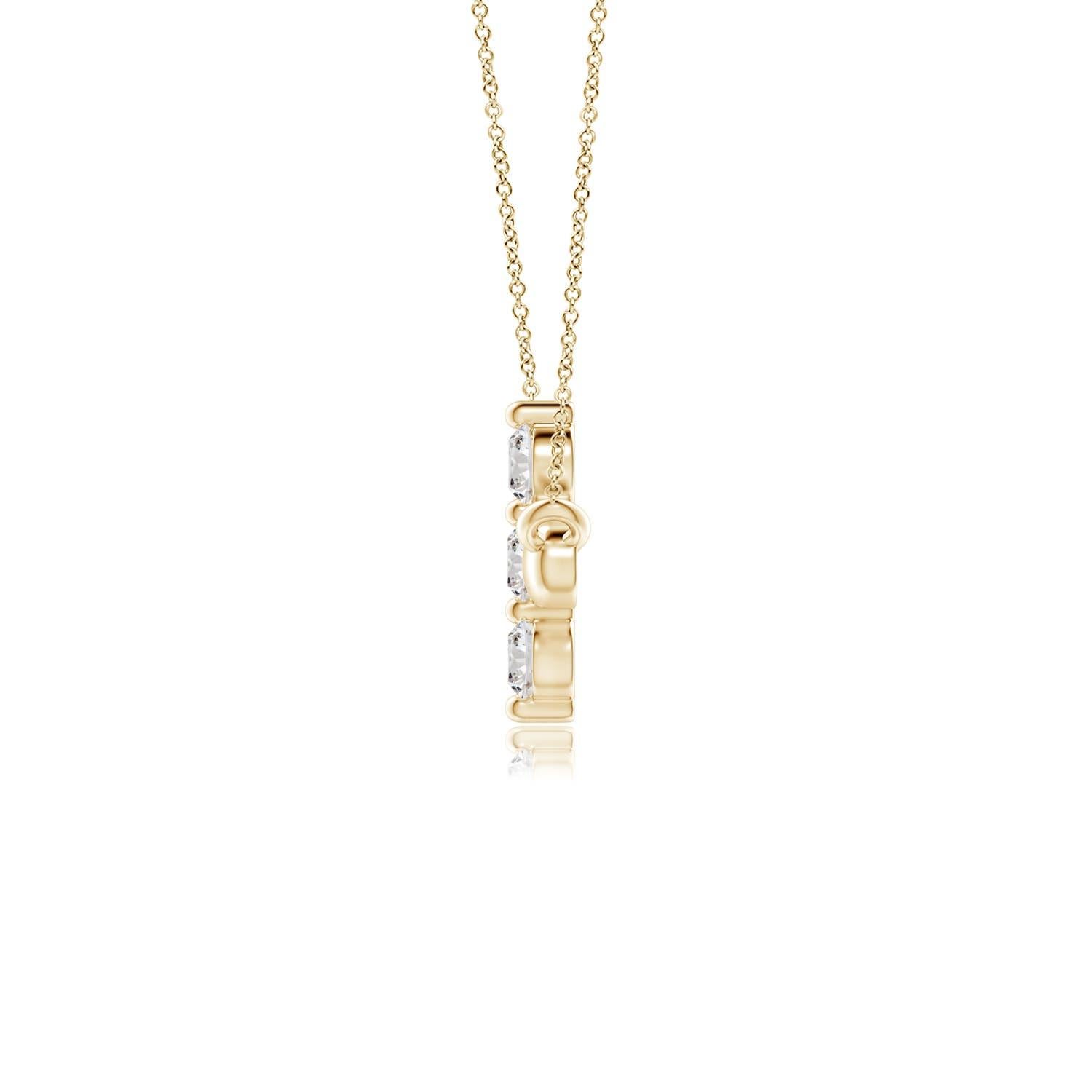 Hanging sideways from a chain is the gorgeous cross pendant crafted in 14k yellow gold. The vertical bar of the cross is adorned with three white diamonds in prong setting. The sparkling diamonds lend an impeccable dazzling effect to this lustrous
