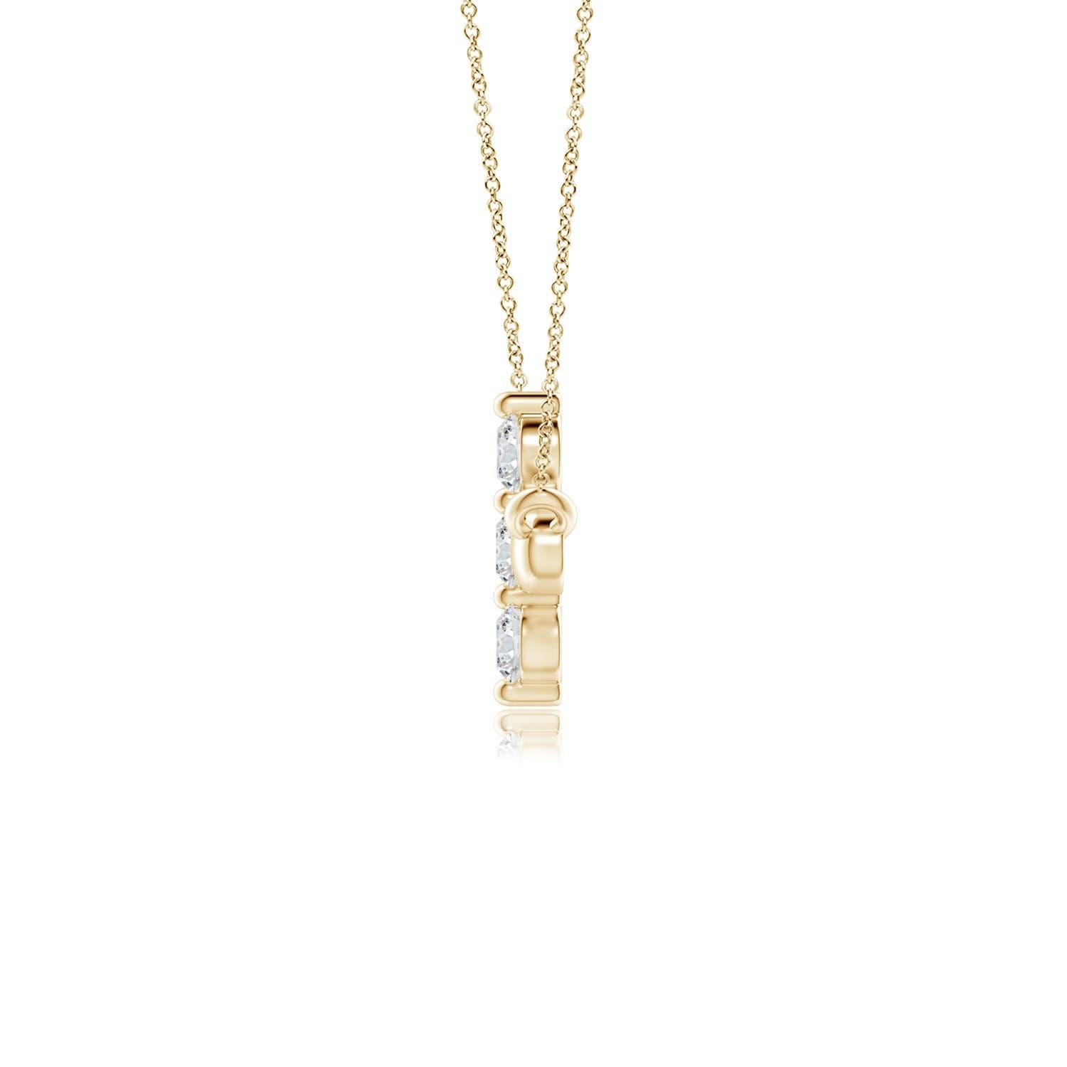 Hanging sideways from a chain is the gorgeous cross pendant crafted in 14k yellow gold. The vertical bar of the cross is adorned with three white diamonds in prong setting. The sparkling diamonds lend an impeccable dazzling effect to this lustrous