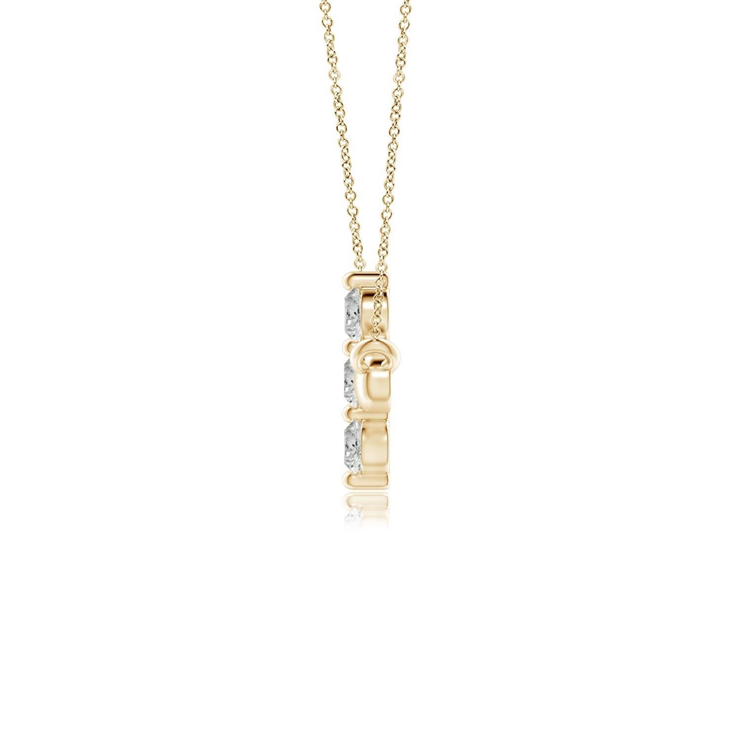 Hanging sideways from a chain is the gorgeous cross pendant crafted in 14k yellow gold. The vertical bar of the cross is adorned with three white diamonds in prong setting. The sparkling diamonds lend an impeccable dazzling effect to this lustrous