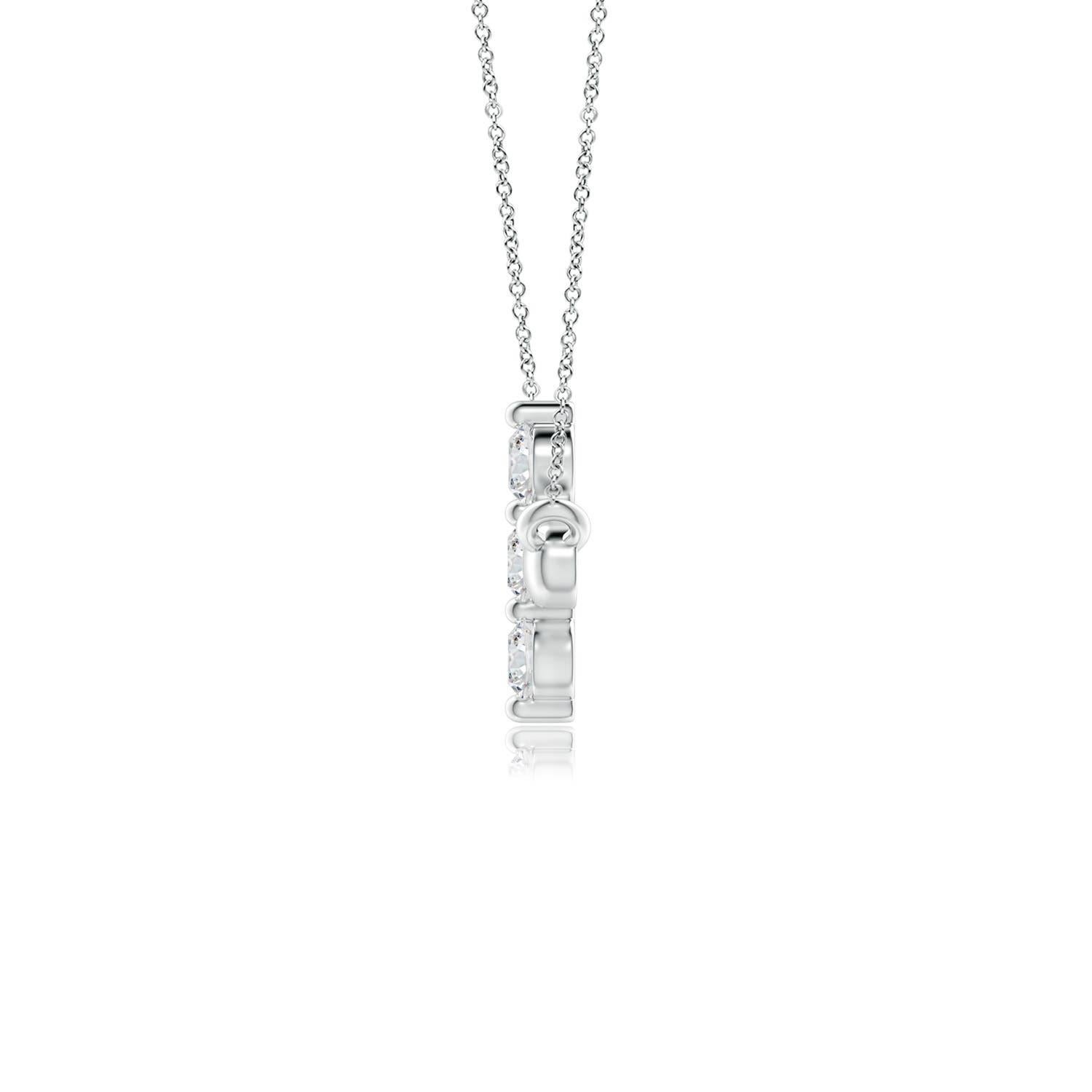 Hanging sideways from a chain is the gorgeous cross pendant crafted in platinum. The vertical bar of the cross is adorned with three white diamonds in prong setting. The sparkling diamonds lend an impeccable dazzling effect to this lustrous sideways