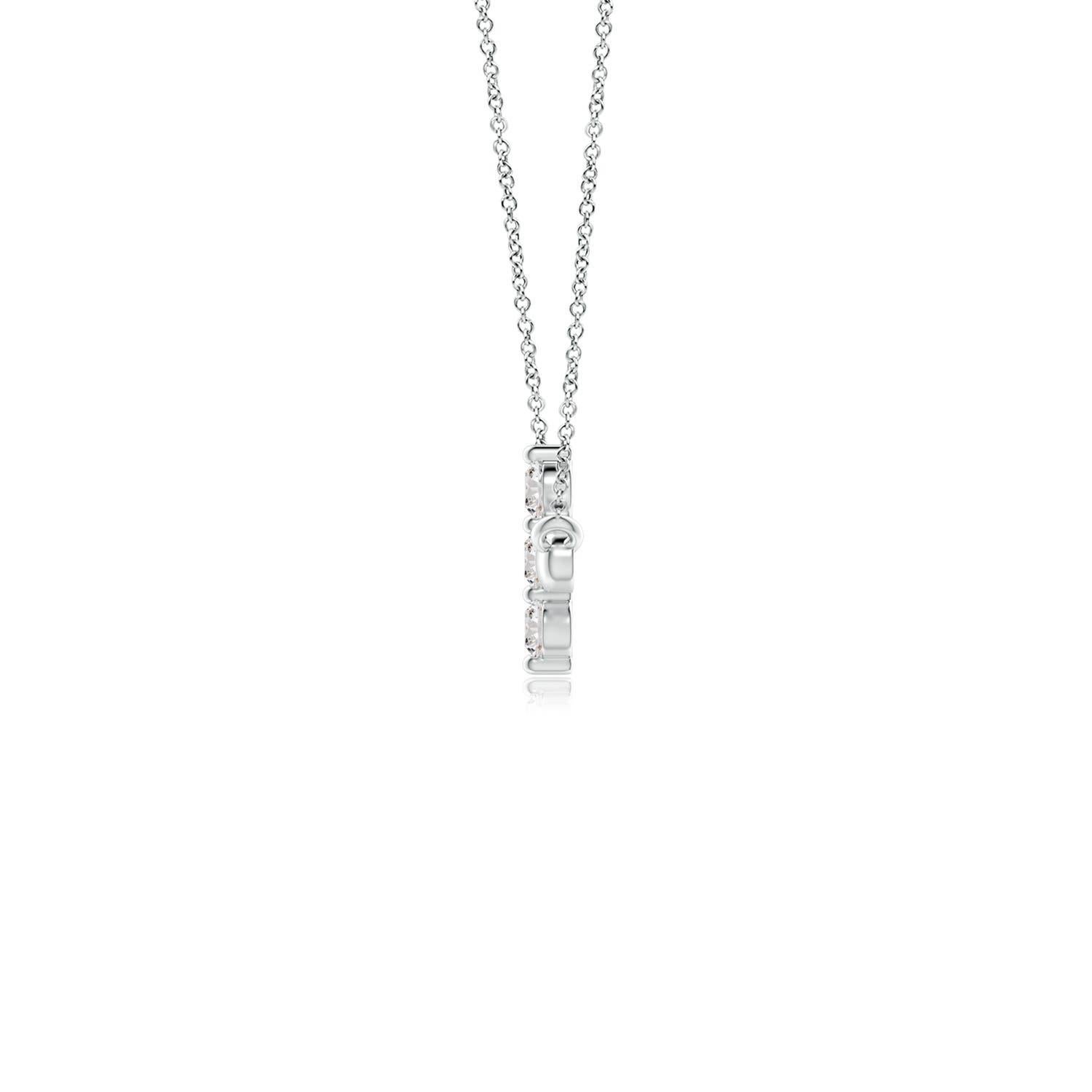 Hanging sideways from a chain is the gorgeous cross pendant crafted in platinum. The vertical bar of the cross is adorned with three white diamonds in prong setting. The sparkling diamonds lend an impeccable dazzling effect to this lustrous sideways