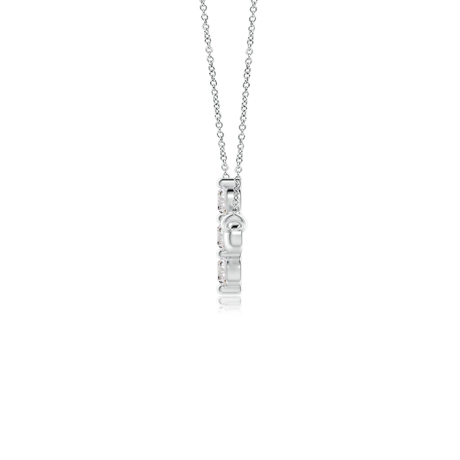 Hanging sideways from a chain is the gorgeous cross pendant crafted in platinum. The vertical bar of the cross is adorned with three white diamonds in prong setting. The sparkling diamonds lend an impeccable dazzling effect to this lustrous sideways