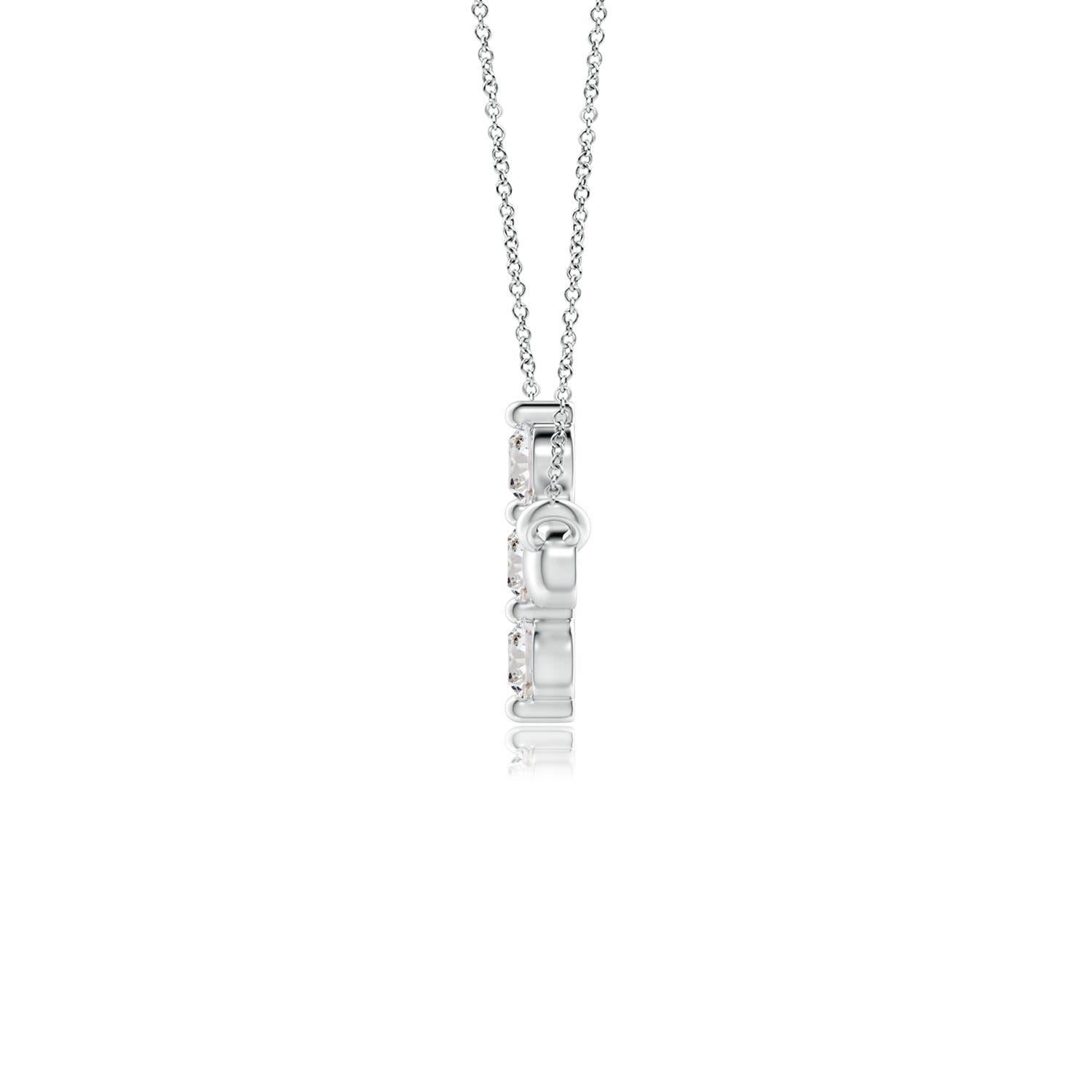Hanging sideways from a chain is the gorgeous cross pendant crafted in platinum. The vertical bar of the cross is adorned with three white diamonds in prong setting. The sparkling diamonds lend an impeccable dazzling effect to this lustrous sideways