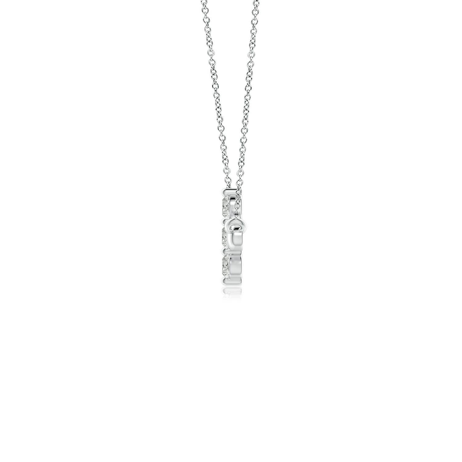Hanging sideways from a chain is the gorgeous cross pendant crafted in platinum. The vertical bar of the cross is adorned with three white diamonds in prong setting. The sparkling diamonds lend an impeccable dazzling effect to this lustrous sideways