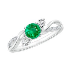 Anello di fidanzamento Angara con smeraldo naturale e diamante a forma di vite attorcigliata in oro 14K