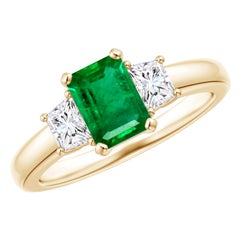 Anello Angara con smeraldo naturale e diamante trapezoidale in oro massiccio 14 carati