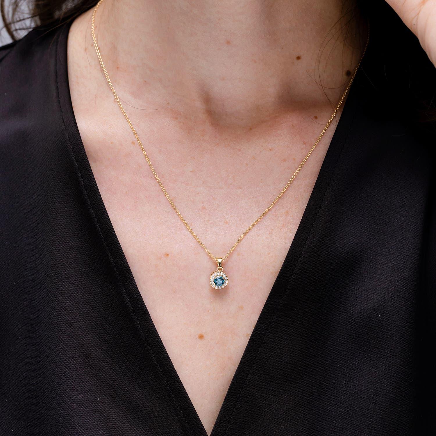 Modern Angara Natural Enhanced Blue and White Diamond Halo Pendant in 14K Solid Gold For Sale