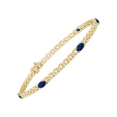A Link Link Bracelet en or massif 14K avec saphir ovale et cinq pierres naturelles.