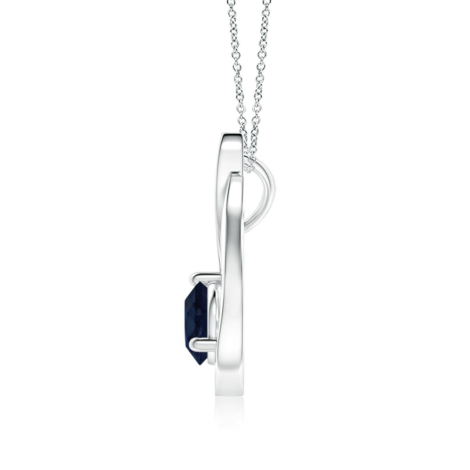 Un pendentif tulipe en platine orné d'un saphir bleu qui vous envoûtera par son éclat divin. Le modèle présente un saphir rond serti sur un anneau et des accents de diamant qui complètent magnifiquement l'éclat de la pierre précieuse, semblable à