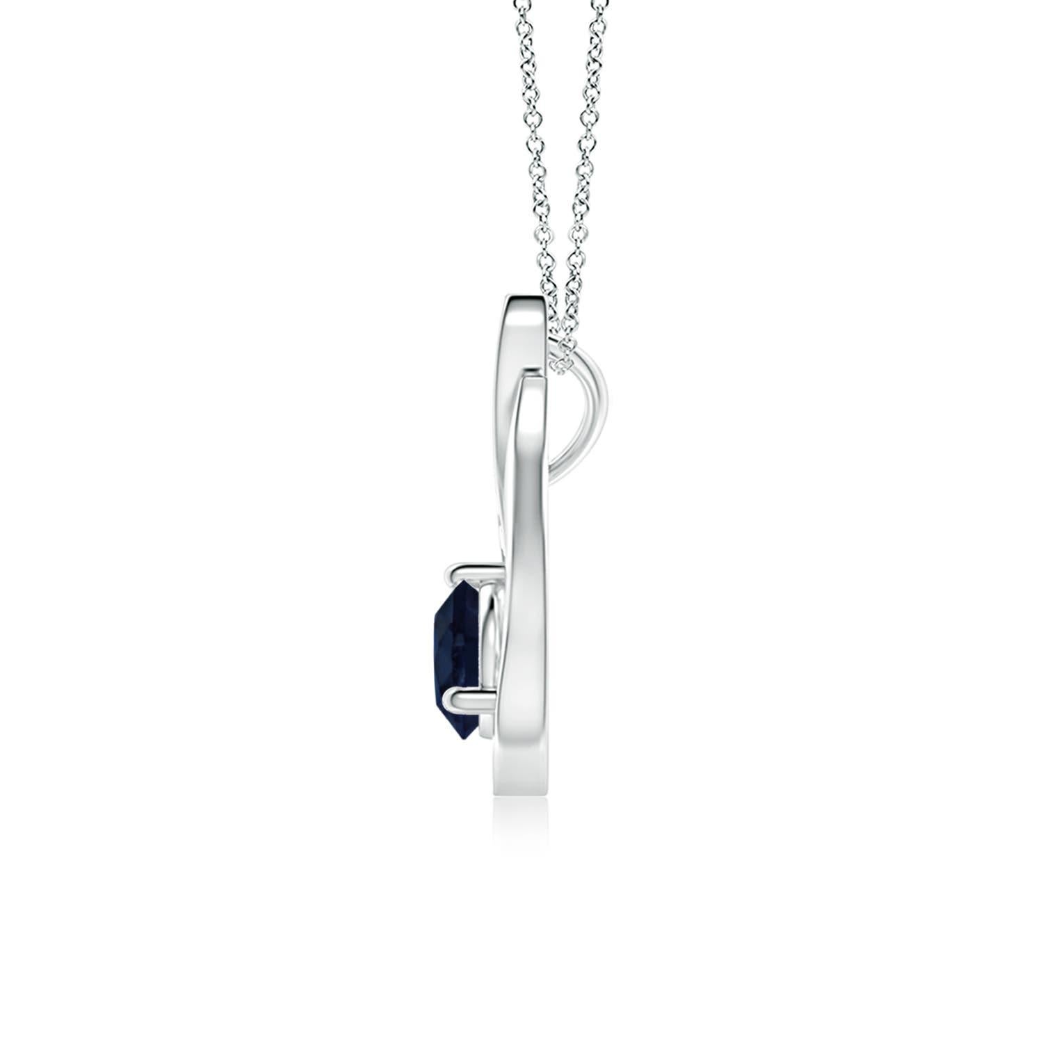 Un pendentif tulipe en or blanc 14k orné d'un saphir bleu pour vous envoûter de son éblouissement divin. Le modèle présente un saphir rond serti sur un anneau et des accents de diamant qui complètent magnifiquement l'éclat de la pierre précieuse,