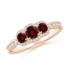 Anillo Angara de Granate Natural Flotante de Tres Piedras con Halo de Diamantes en Oro de 14K