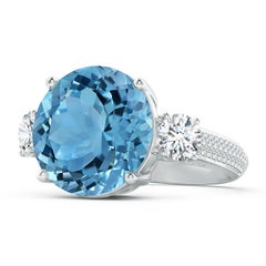 Angara Anillo de oro de 14 quilates con tres piedras de topacio azul celeste de 11,67 ct, certificado por el GIA