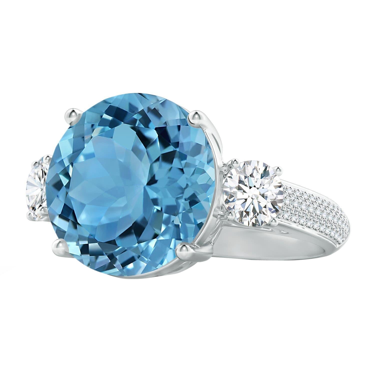 Anello a tre pietre in oro 14K con topazio blu cielo di 11,67 carati certificato GIA da Angara. in vendita
