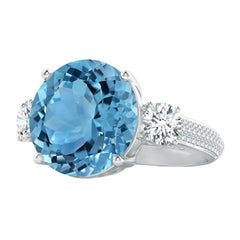 Anello a tre pietre in oro 14K con topazio blu cielo di 11,67 carati certificato GIA da Angara.