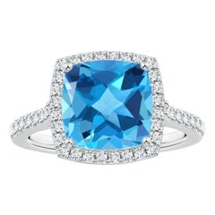 Anello aureolato in oro 14K con Topazio Blu Svizzero di Angara Nature certificato GIA a cuscino 4,8ct