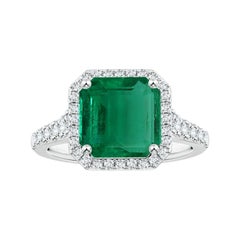 Angara Natural GIA Certified Emerald-Cut Emerald Ring with Diamond in 14K Gold