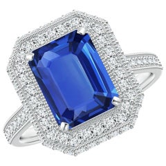 Anello aureolato con zaffiro blu da 3,17 carati certificato GIA di Angara Nature in oro 14 carati