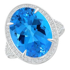 Angara Anillo de cóctel de oro de 14 quilates con topacio azul ovalado de 10,89 quilates, certificado por el GIA