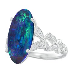 Angara Anillo de diamantes de ópalo negro natural ovalado de 5,79 ct certificado por el GIA en oro de 14 quilates