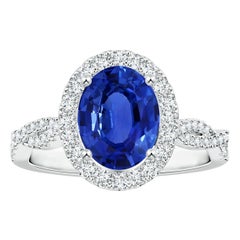 Angara Natural GIA Certified Oval Sapphire Halo Ring with Diamonds in 14K Gold