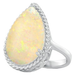 Angara Anillo de cóctel de ópalo natural certificado por el GIA de 7,81 ct en oro macizo de 14 quilates