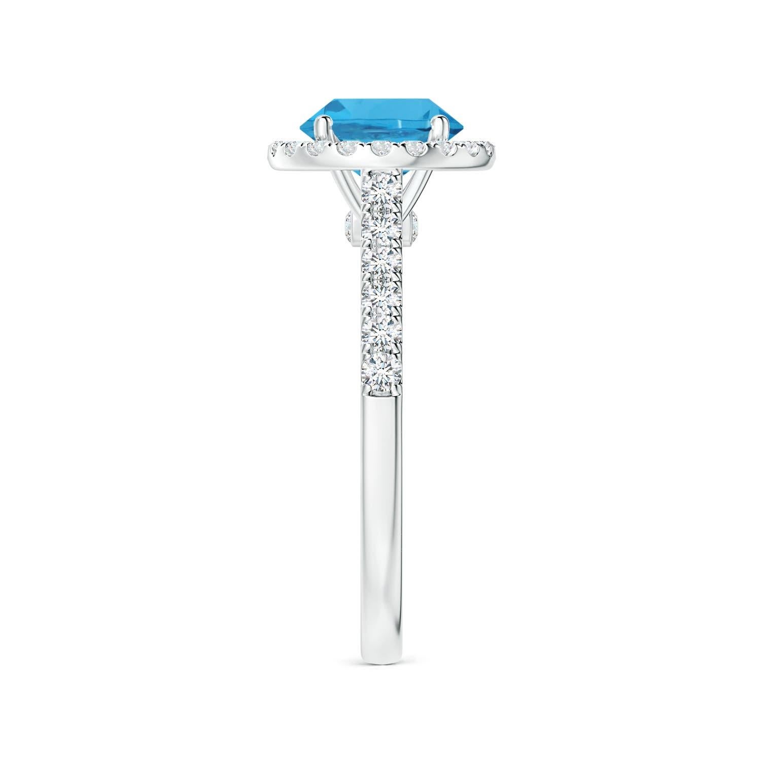 Taglio rotondo Anello aureolato in oro 14K con Topazio Blu Svizzero, Nature, certificato GIA, 1,56ct. in vendita