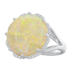Angara Anillo de Ópalo Natural Redondo Certificado GIA de 8,39ct con Halo Floral en Oro de 14K