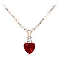 ANGARA Natural Heart-Shaped 0.55ct Ruby Rabbit Ear Bale Pendant in Rose Gold