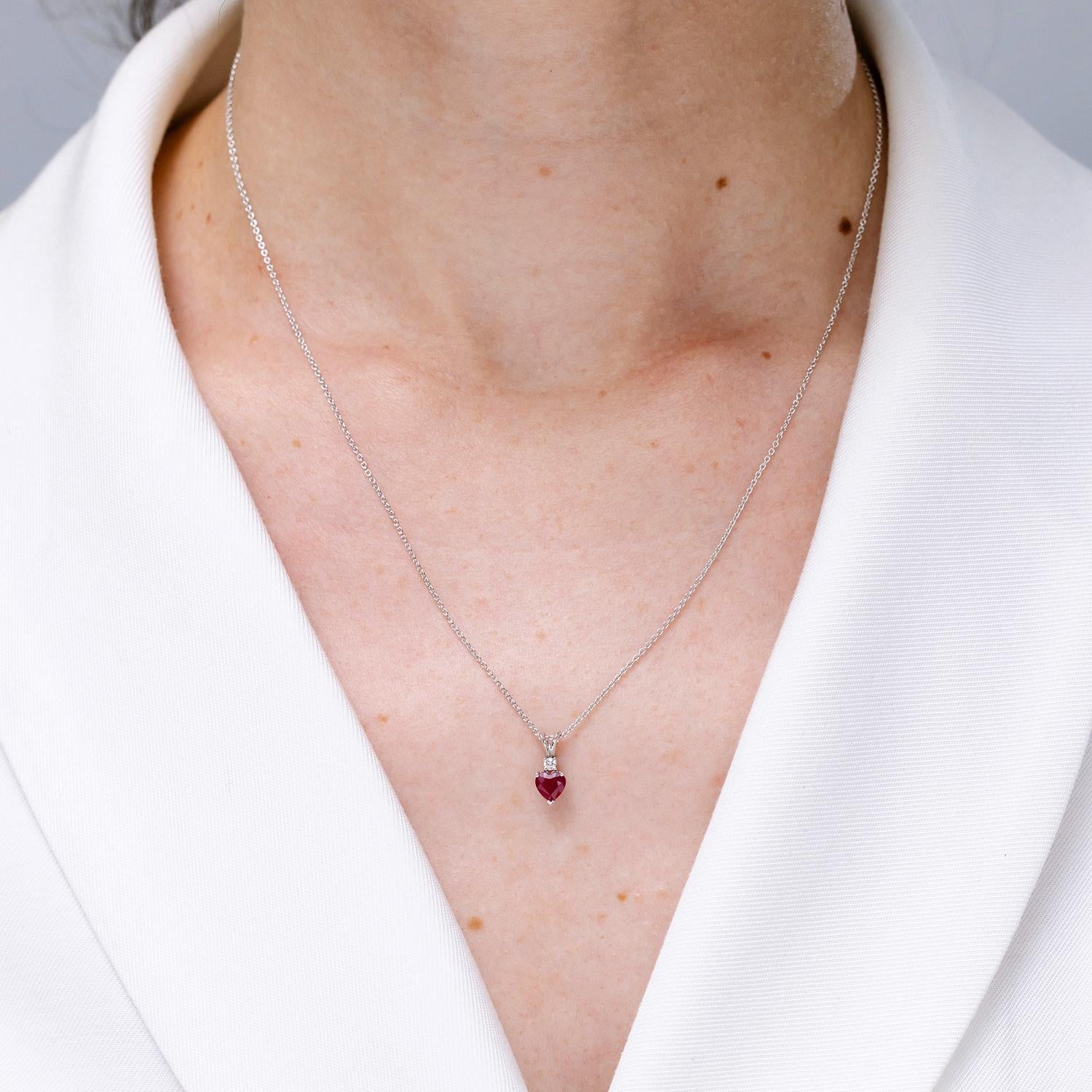 Women's ANGARA Natural Heart-Shaped 0.80ct Ruby Rabbit Ear Bale Pendant in Yellow Gold For Sale