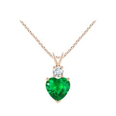 Angara Smeraldo naturale a forma di cuore da 1,2 carati con ciondolo di diamanti in oro rosa 14 carati