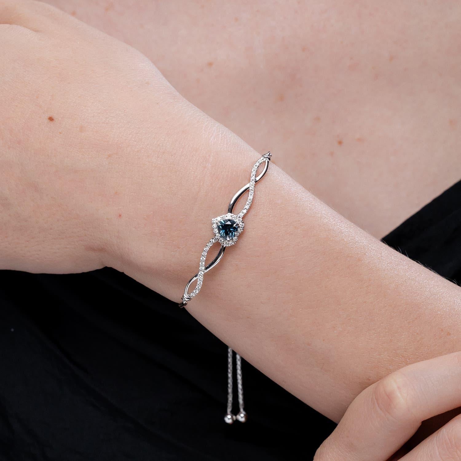 Heart Cut Angara Natural Heart-Shaped London Blue Topaz Infinity Bolo Bracelet in 14K Gold For Sale