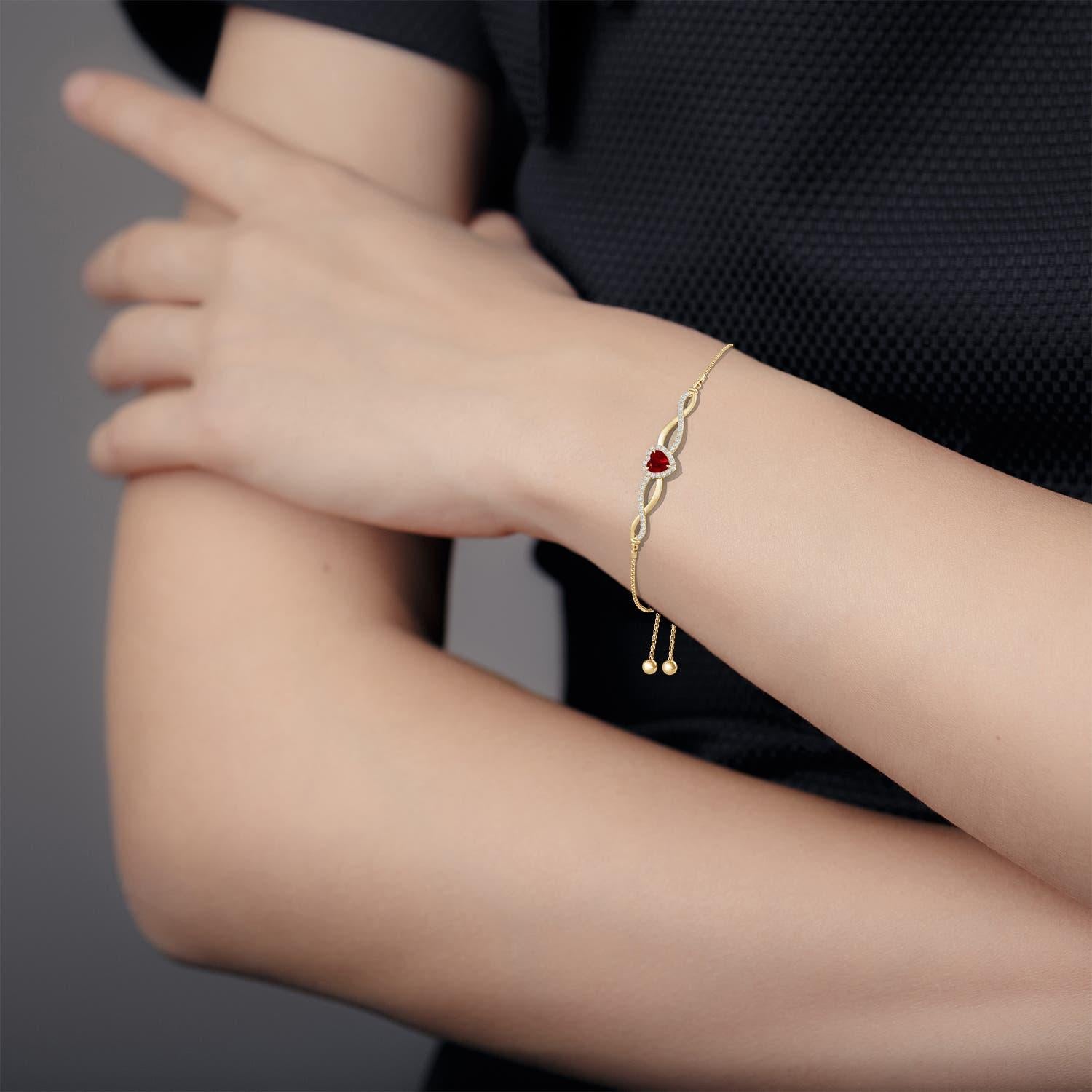 Angara Natural Heart-Shaped Ruby Infinity Bolo Bracelet in 14K Gold for Women In New Condition For Sale In Los Angeles, CA