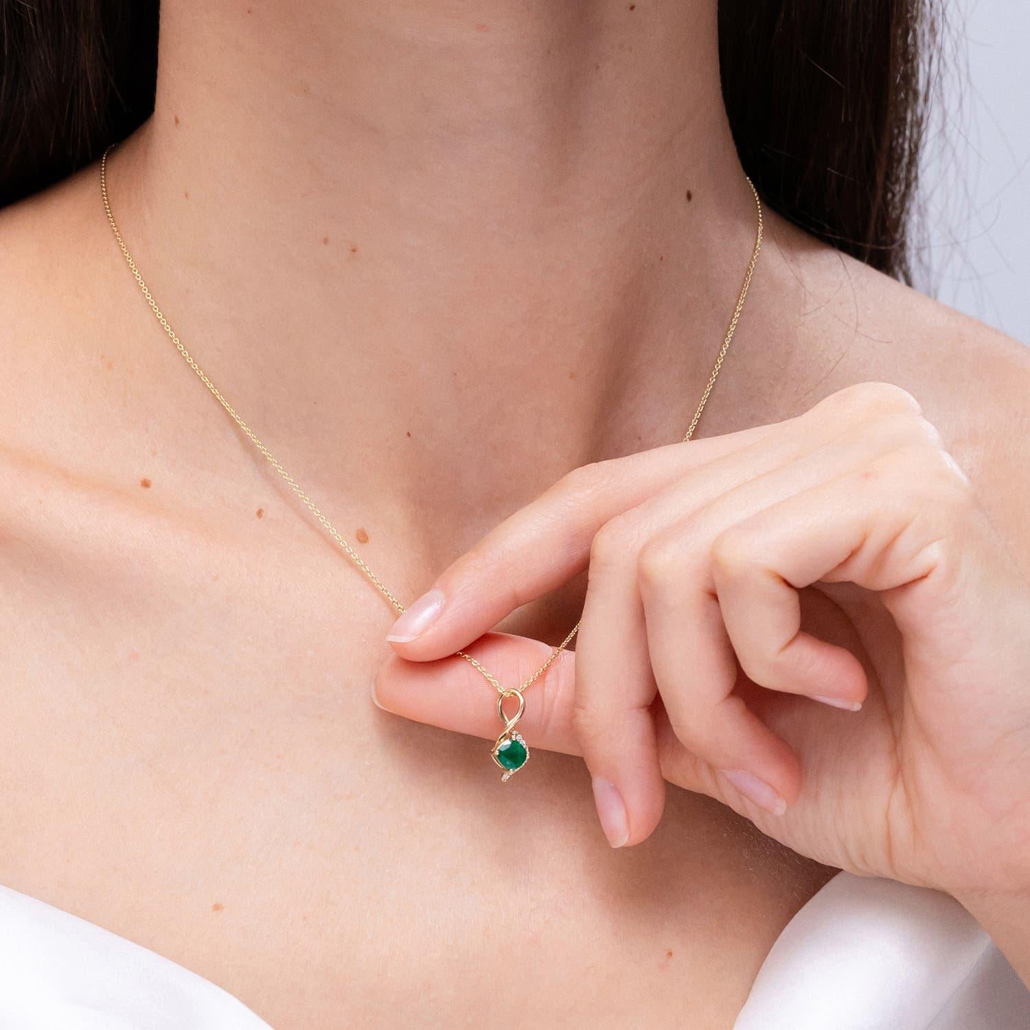 Modern Angara Natural Infinity Twist Emerald Pendant with Diamond in 14K Solid Gold For Sale