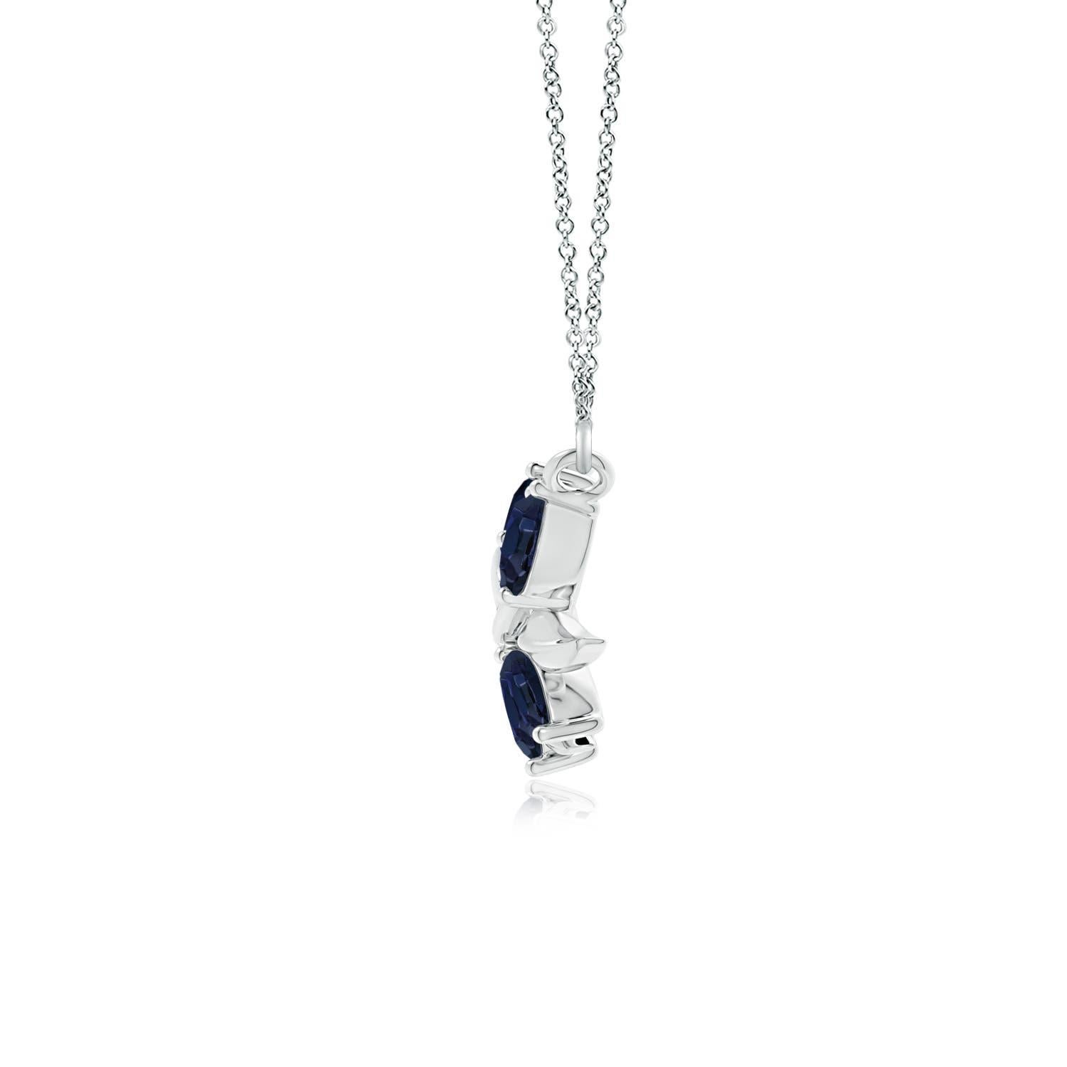 Elegantemente disegnata a forma di ramo d'ulivo con zaffiri a forma di marquise e pera incastonati e motivi di foglie lucide, questa collana è un'ode alla bellezza della natura. La disposizione alternata delle incantevoli gemme blu e delle foglie