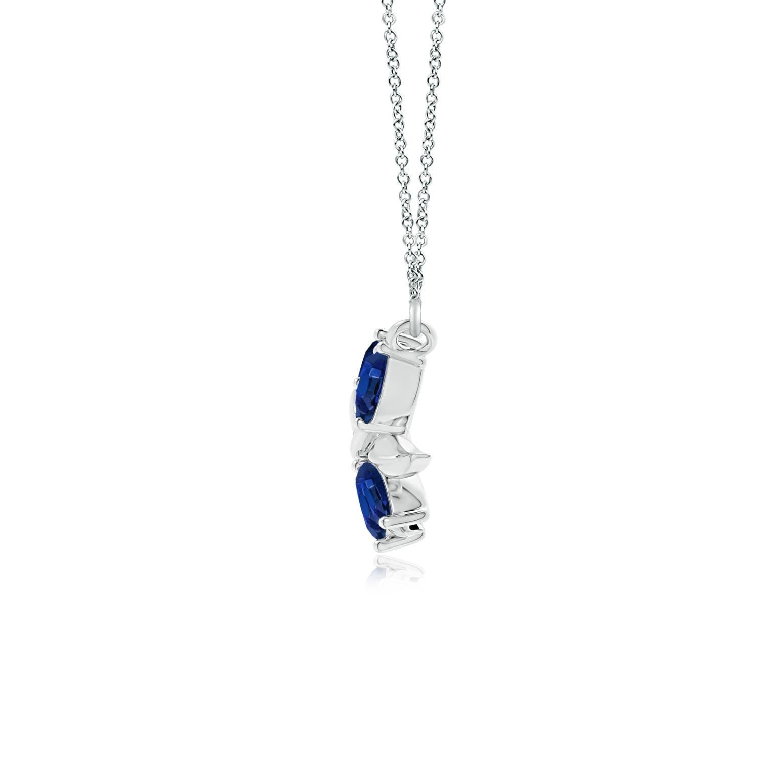 Elegantemente disegnata a forma di ramo d'ulivo con zaffiri a forma di marquise e pera incastonati e motivi di foglie lucide, questa collana è un'ode alla bellezza della natura. La disposizione alternata delle incantevoli gemme blu e delle foglie