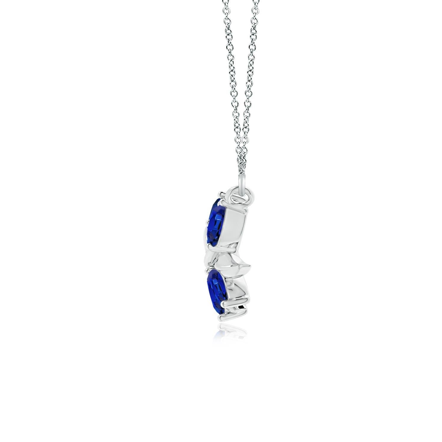 Elegantemente disegnata a forma di ramo d'ulivo con zaffiri a forma di marquise e pera incastonati e motivi di foglie lucide, questa collana è un'ode alla bellezza della natura. La disposizione alternata delle incantevoli gemme blu e delle foglie