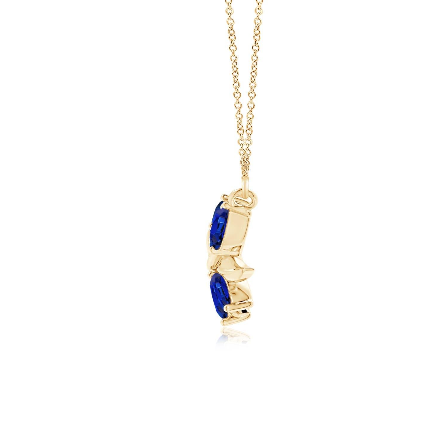 Elegantemente disegnata a forma di ramo d'ulivo con zaffiri a forma di marquise e pera incastonati e motivi di foglie lucide, questa collana è un'ode alla bellezza della natura. La disposizione alternata delle incantevoli gemme blu e delle foglie